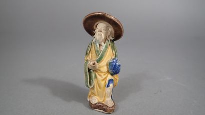 Ensemble de quatre statuettes en grès de...