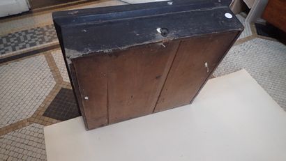 Grande pendule œil de bœuf en bois noirci...
