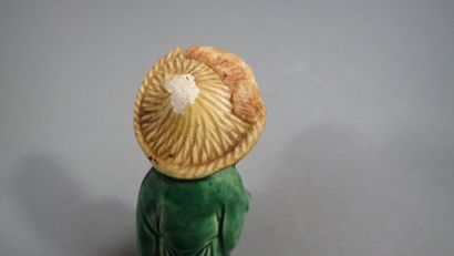 Ensemble de quatre statuettes en grès de...