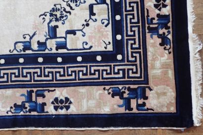 Chinese wool and silk rug in shades of white...