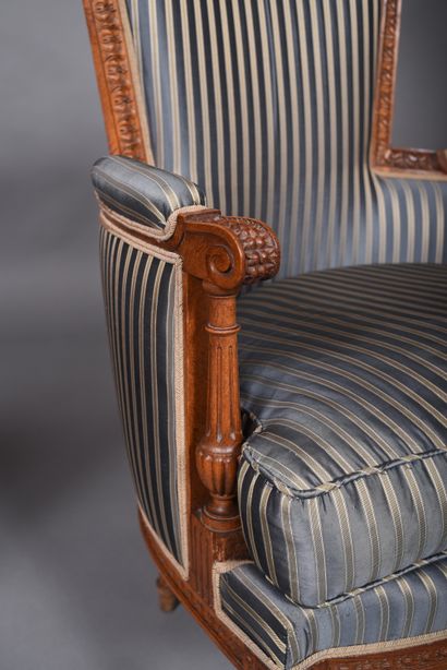 Pair of molded and carved beech bergères...