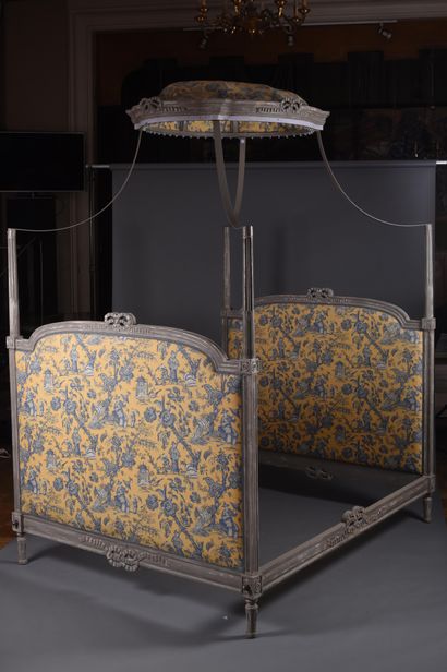 Polish-style bed in molded and carved wood...