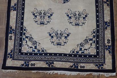 Chinese wool and silk rug in shades of white...