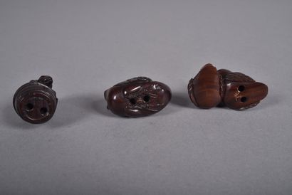 Set of three carved wood netsukes: 
- a pair...