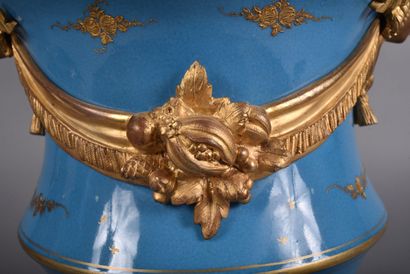 A large covered perfume burner pot in celestial-blue...
