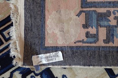 Chinese wool and silk rug in shades of white...