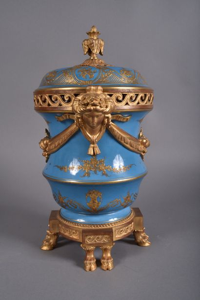 A large covered perfume burner pot in celestial-blue...