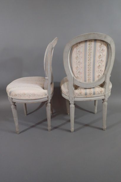 Set of four gray rechambered wood chairs...