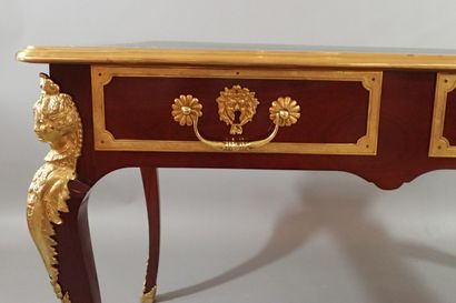 Mahogany and mahogany veneer flat desk, the...