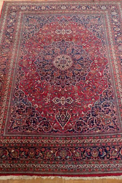 Very large oriental wool carpet in burgundy...