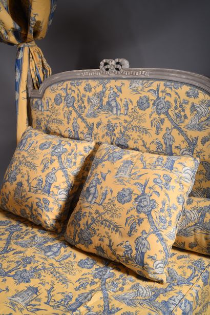 Polish-style bed in molded and carved wood...