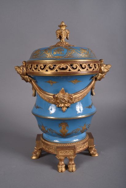 A large covered perfume burner pot in celestial-blue...