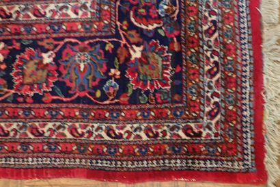 Very large oriental wool carpet in burgundy...