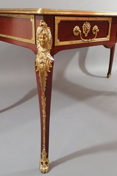 Mahogany and mahogany veneer flat desk, the...