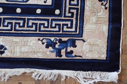 Chinese wool and silk rug in shades of white...