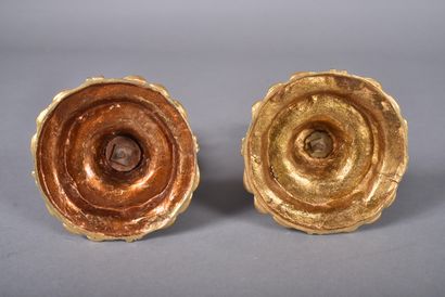 Pair of ormolu candlesticks, the tap in the...