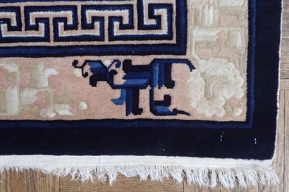 Chinese wool and silk rug in shades of white...