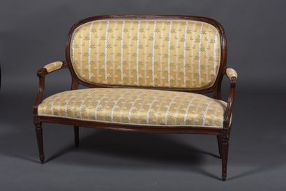 Molded and carved mahogany sofa resting on...