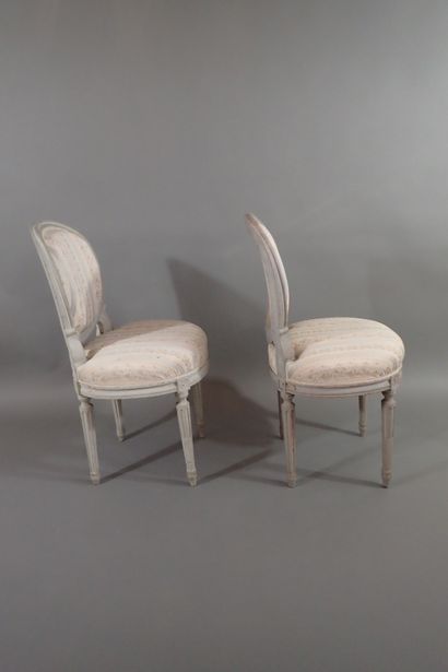 Set of four gray rechambered wood chairs...