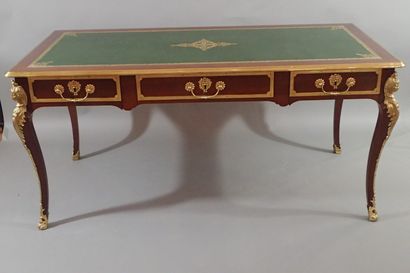 Mahogany and mahogany veneer flat desk, the...