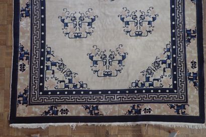 Chinese wool and silk rug in shades of white...