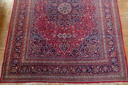 Very large oriental wool carpet in burgundy...