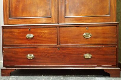 Mahogany and mahogany veneer cabinet opening...