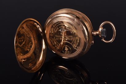 Pocket watch in 18K yellow gold, white enamel...