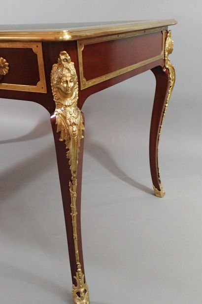 Mahogany and mahogany veneer flat desk, the...