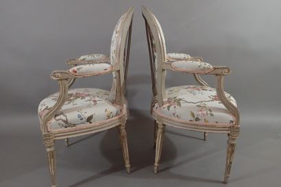 Four molded beech cabriole armchairs with...