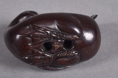 Set of three carved wood netsukes: 
- a pair...