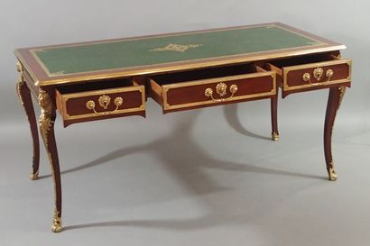Mahogany and mahogany veneer flat desk, the...