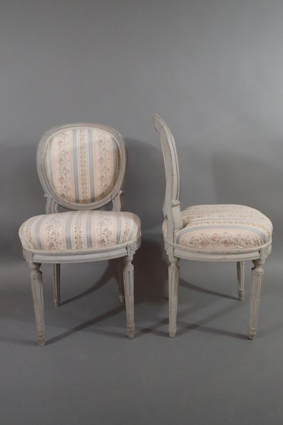 Set of four gray rechambered wood chairs...