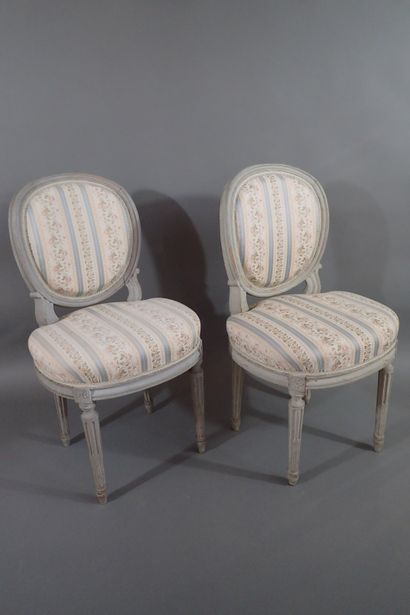 Set of four gray rechambered wood chairs...