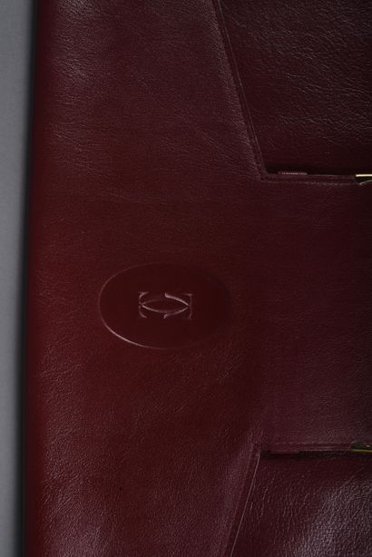 CARTIER. MUST briefcase in burgundy leather...