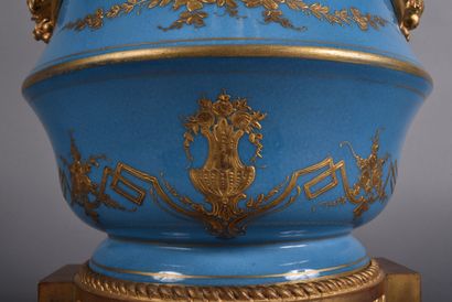 A large covered perfume burner pot in celestial-blue...