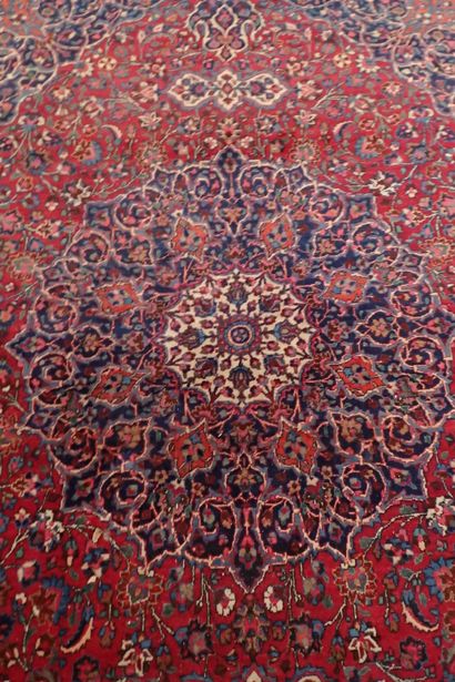 Very large oriental wool carpet in burgundy...