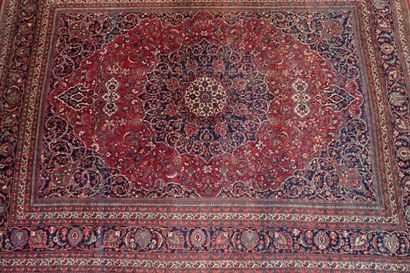 Very large oriental wool carpet in burgundy...
