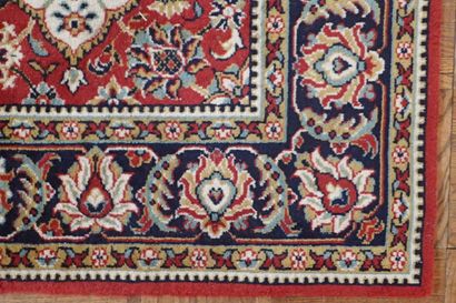 Large mechanical wool rug with floral motifs...