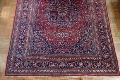 Very large oriental wool carpet in burgundy...