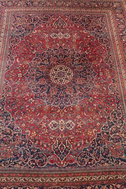 Very large oriental wool carpet in burgundy...