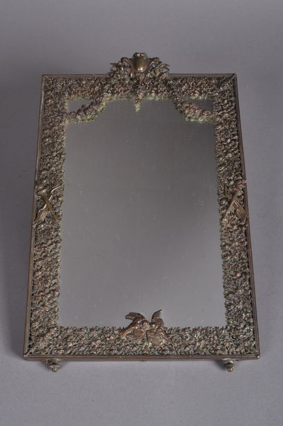 Framed mirror in finely chased bronze with...