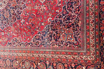 Very large oriental wool carpet in burgundy...