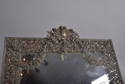 Framed mirror in finely chased bronze with...
