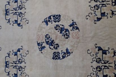 Chinese wool and silk rug in shades of white...