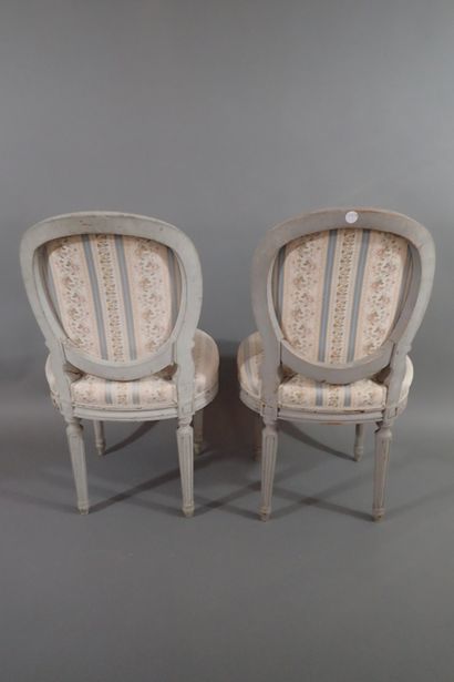 Set of four gray rechambered wood chairs...