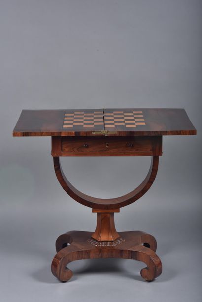 Wallet games table in rosewood veneer, revealing...