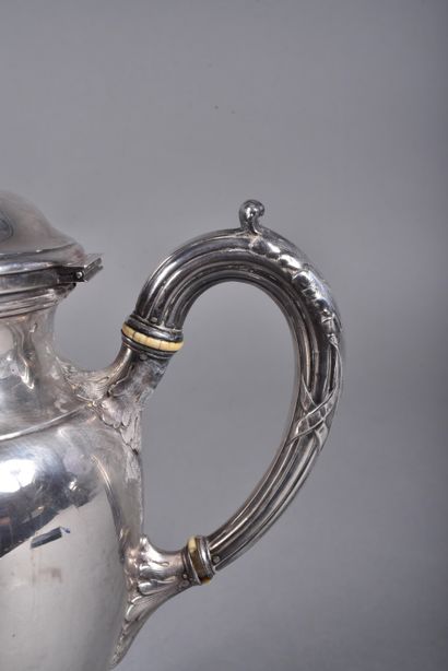 Part of a silver coffee service including...