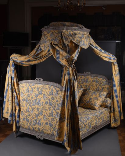 Polish-style bed in molded and carved wood...