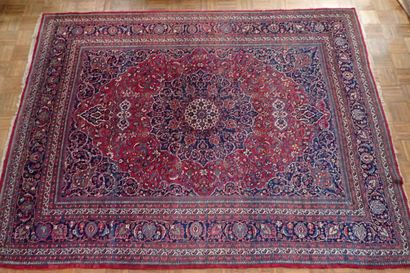 Very large oriental wool carpet in burgundy...
